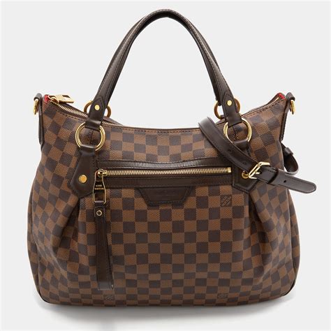 Louis Vuitton Evora Handbag Damier MM .